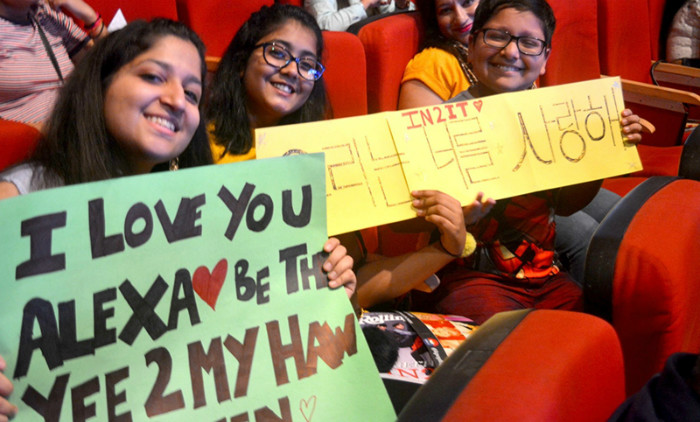 The audience on April 19 at the Siri Fort Auditorium in New Delhi hold placards expressing their love for both Alexa and In2it.